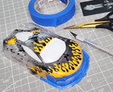 1/28 Mini-z Lexan body shell with Dots and Micro Drips pre-cut vinyl Masking Stencils applied and ready for paint.