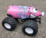 Custom painted RC pig pop bottle body shell using xxx main Drippin' splatter drips stickers.