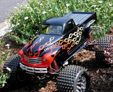 Custom painted Traxxas T-Maxx using Flame Strings pre-cut vinyl Paint Masks by xxx main Racing.