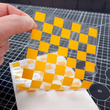 Transfer Tape holds Large Checkers vinyl Paint Mask together and ready for install into your RC body shell