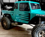 xxx main Racing Scallops pre-cut vinyl RC Car Paint Mask on a Vanquish Trail Truck