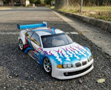 Spikes pre-cut vinyl RC paint masking stencils on an HPI BMW body shell.