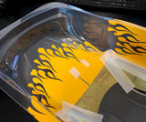 Tribal Flames pre-cut vinyl Paint Masking Stencils installed in a Tamiya RC Car Body ready for a custom paint job.
