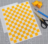 X-Large Checkers pre-cut vinyl RC Masking sheet weeded and ready for installation into a Lexan Body Shell with the included Transfer Tape.